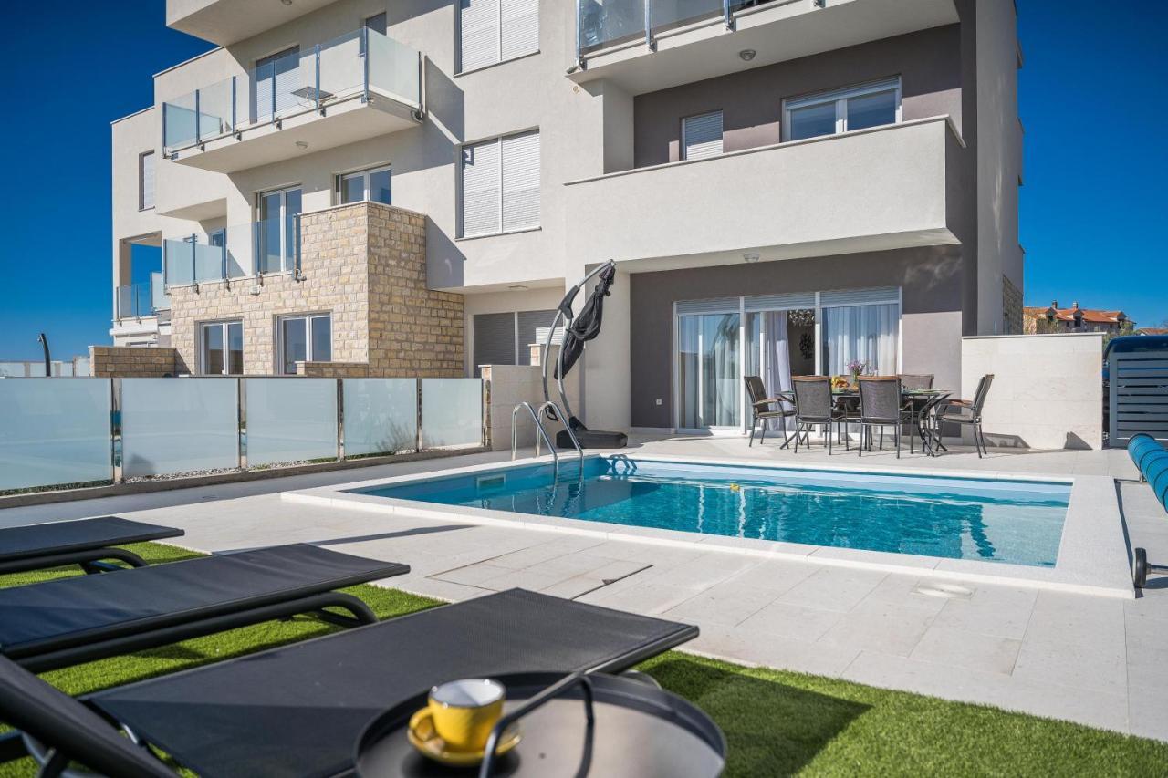 Pool terrace with sun loungers
